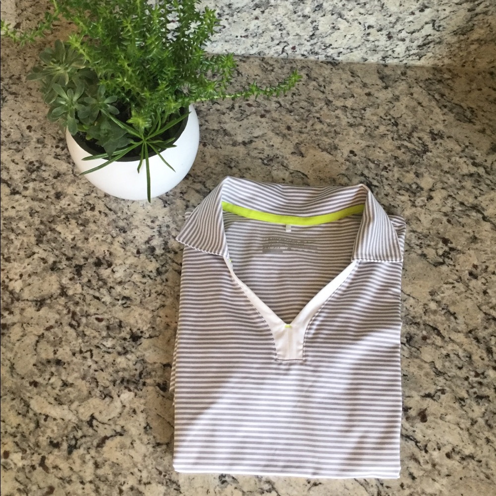 Women Nike Grey and White Golf Shirt.